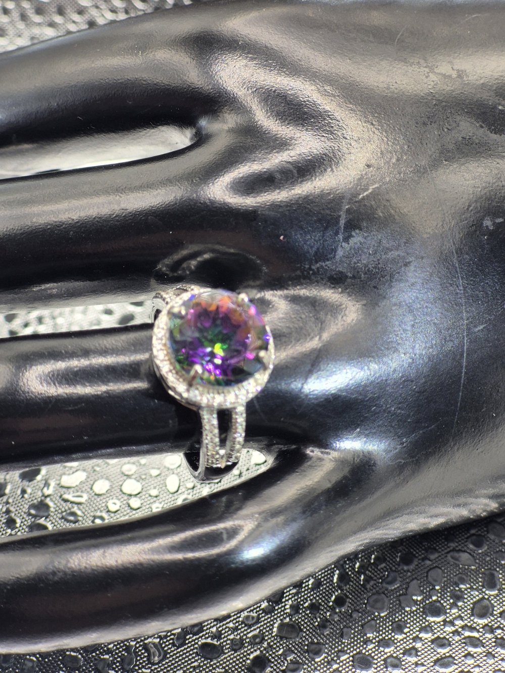 Beautiful Multi Colored Mystic Topaz Surrounded By White Topaz Accents Ring